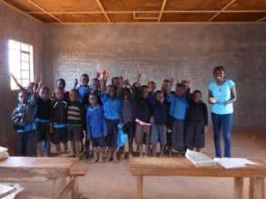 Mercy with pupils at Ngambenyi Primary