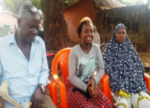 Aissatou (center) with her disabled father