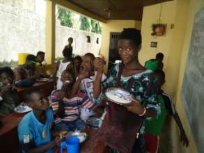 Students at MindLeaps Guinea enjoy a daily meal