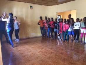 Anna teaches class to MindLeaps students