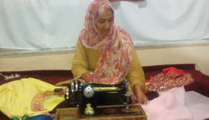 Mah Jan creating beautiful clothing.