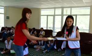 Bermet as a volunteer in the class