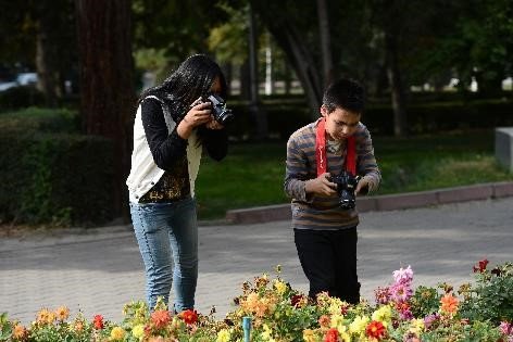 Empower Disadvantaged Children through Photograph