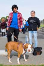 TLC student with shelter dog and adopter