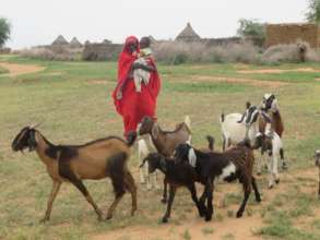 A family with their goats