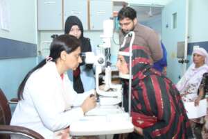 Parveen undergoing eye examination