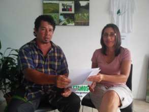 Patricia and Fernand discussing building materials