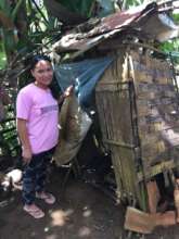 Broken-down latrine needing repair