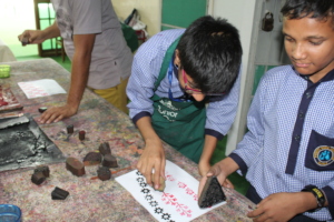 Trainees trying their hand at block print