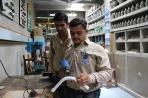Jahanzeb demonstrating his plumbing skills
