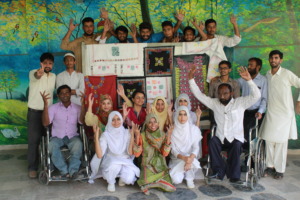 Group picture with clapping in sign language at JS