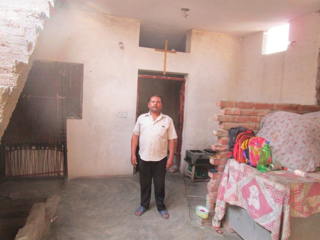 Khalid's tailoring means his kids can go to school