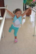 Salo uses her hands to hang on and move around