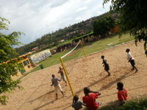 Boys Playing Beach volleyball at the center