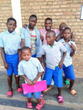 Teacher Gratien with Students