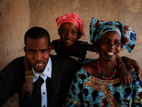 Oumou with her brother and daughter