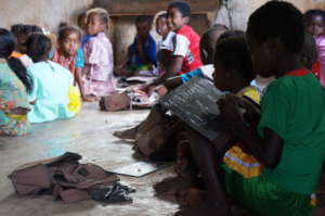 Kids forced to work on the floor without benches