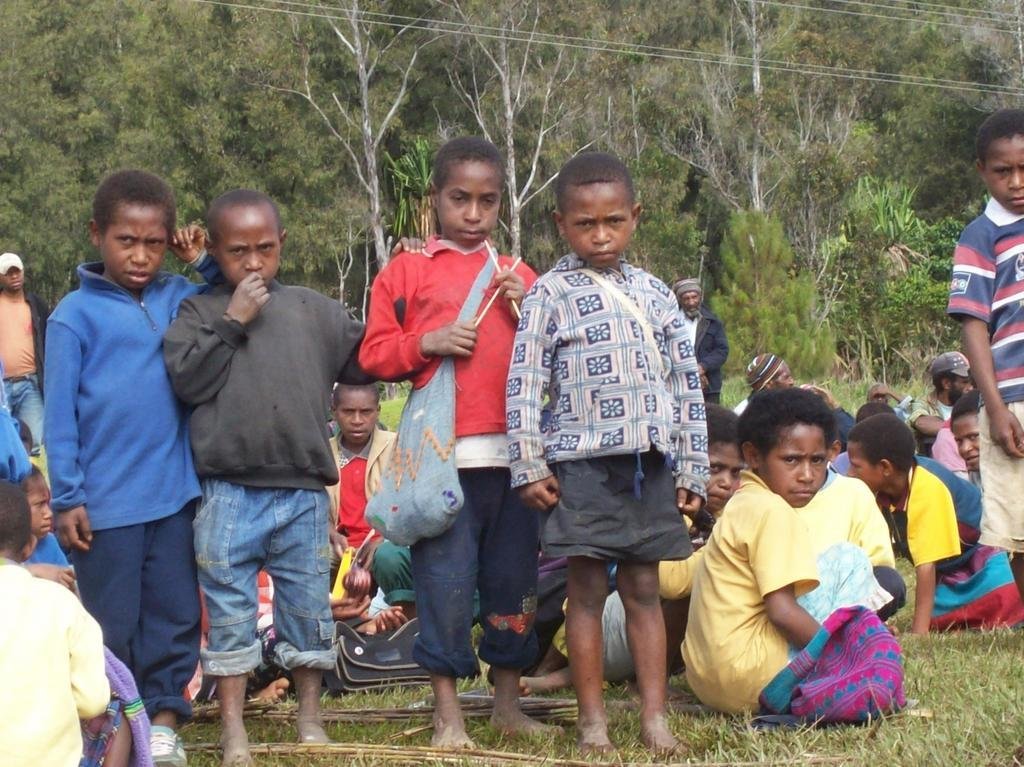 Papua New Guinea Children in traditional Welcome a