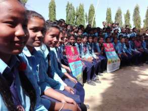 Girls claping in the bicycle gifting ceremony