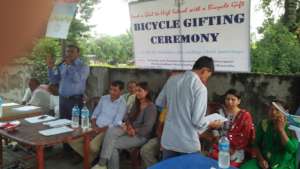 Head teacher of the school addressing the ceremony