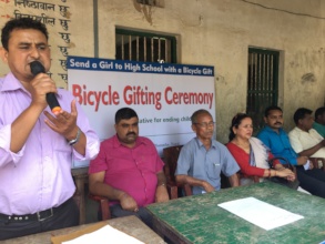 Officials in the bicycle gifting ceremony