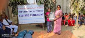 A school teacher handing over the bag