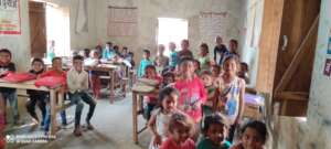 Students in their class before handing over