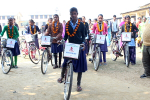 Girls ready to go home with their new bicylcle