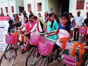 Recipient girls with their family members
