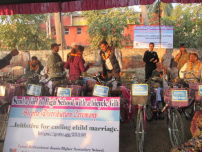 Handing over of key in a distribution ceremony