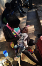 Young mum and baby met by Kimbilio outreach team