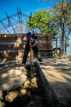 Volunteer working on rubbling Dhauleshwori