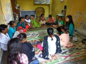 Vaishnavi conducting a session with young children