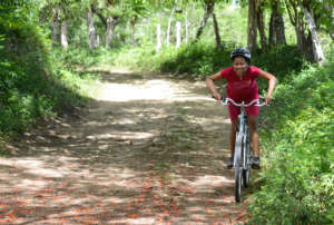 Viviana leading the way on her bike