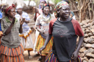 Women use song and dance to educate others