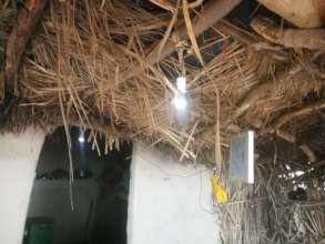 Solar panel small helping to bring light in rural