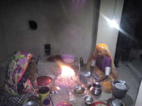 in the night women sewing