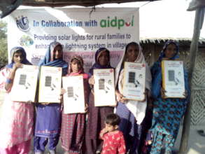Women happy to recive solar lights for their house