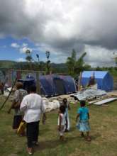 Tent on former house foundation