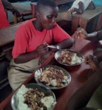 Enjoying a meal at Muko School.
