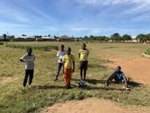 Children looking after the garden after school
