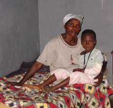 Woman and child at CEDERI Madimba Clinic