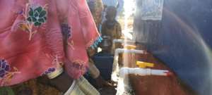 Women Filling their Pots with Water