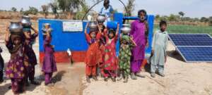 Childrens are happy to get sweet drinking water