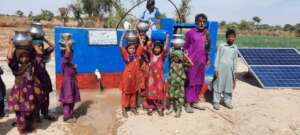 Childrens are happy to get sweet drinking water