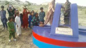 Children with water pitchers
