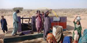 People are filling containers with safe water