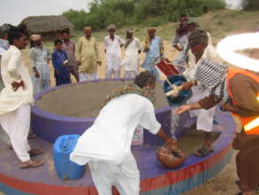 Filling of water pitchers.