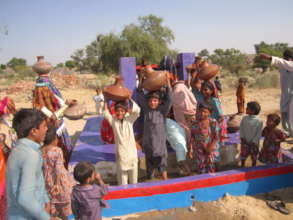 Women and Children are happy to get hygienic water