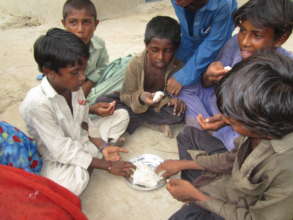 The children celebrating the new water well.